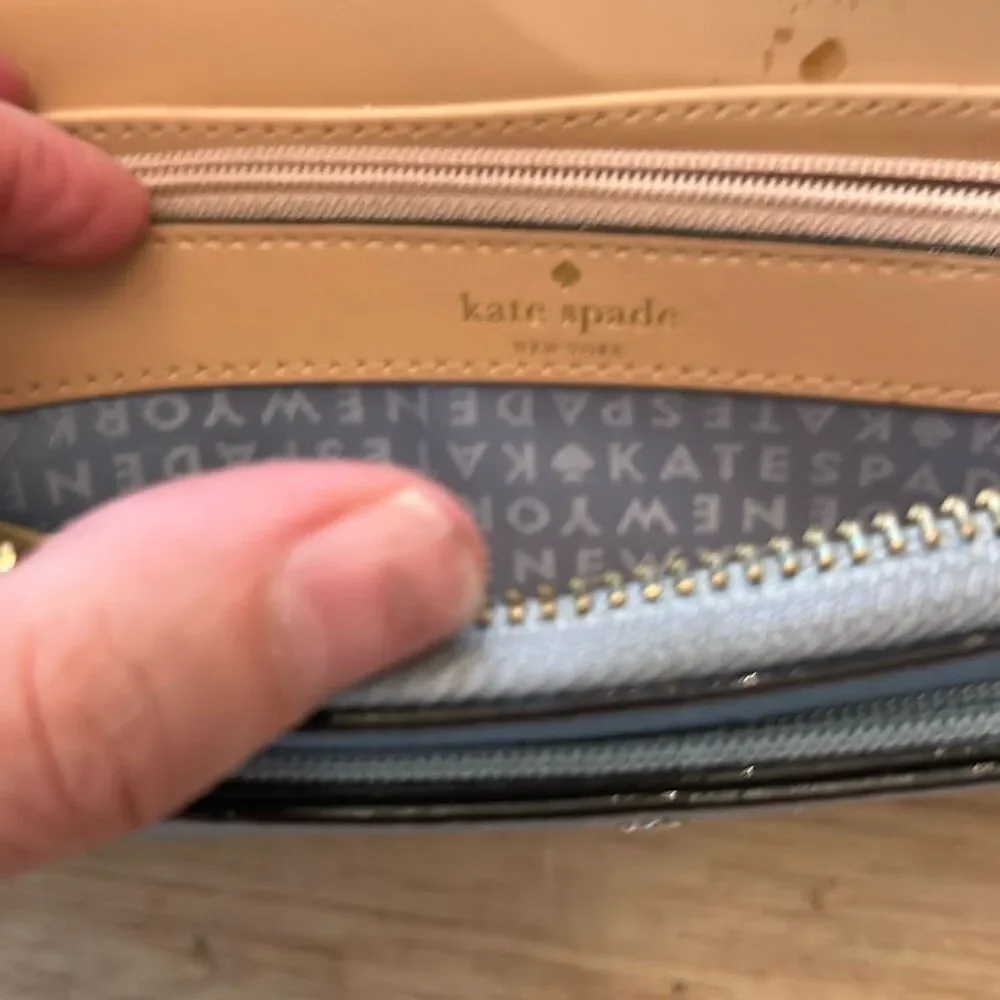 Kate spade blush wallet.